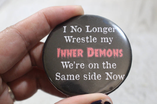 I no longer wrestle my inner demons metal button 2.25in