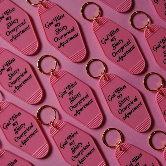 God Bless my Shitty Overpriced Apartment keychain