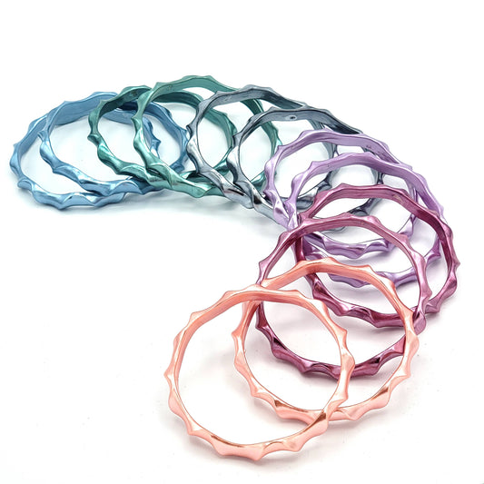 Vintage 80s Vibrant Wavy Plastic Bangle Bracelet Set of 12