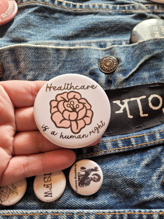 Healthcare is a Human Right Two Inch Button