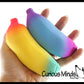 1 Random Rainbow Colored Squishy Sand Banana Toy