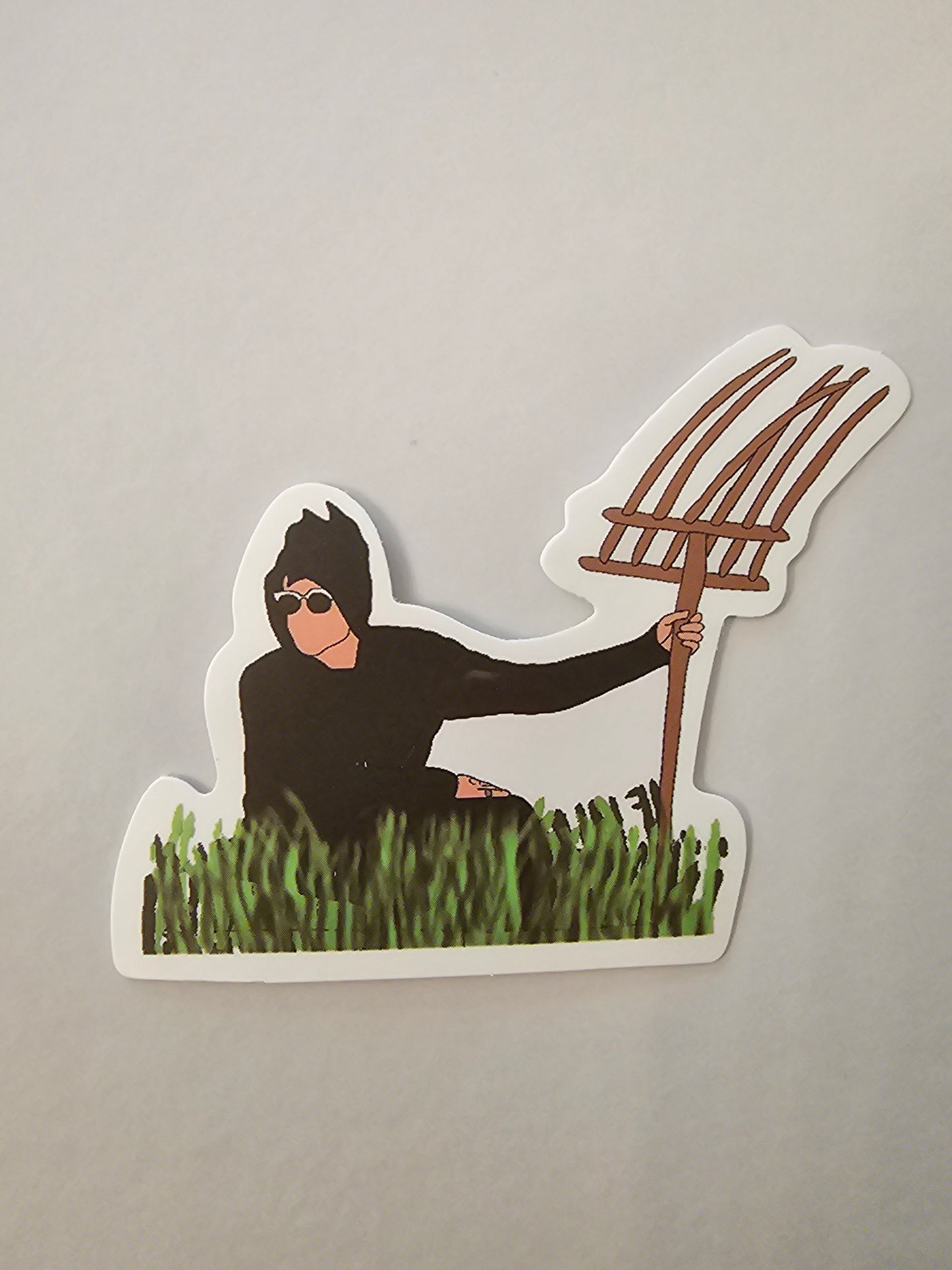 Schitt's Creek in the grass sticker